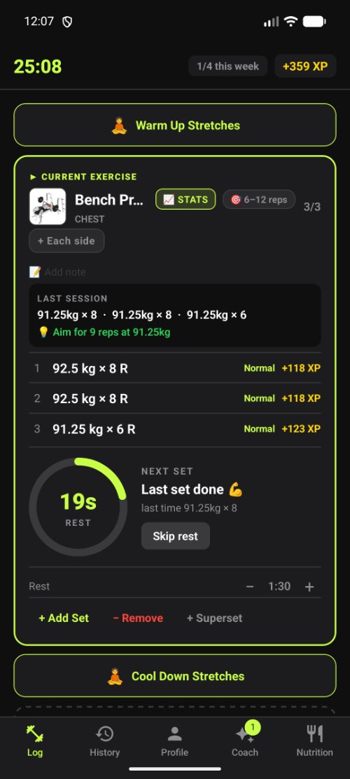 Live workout screen logging sets with last session's numbers shown on each exercise